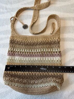 The Sak Crochet Neutral Stripe Crossbody Bag in Beige and Mauve